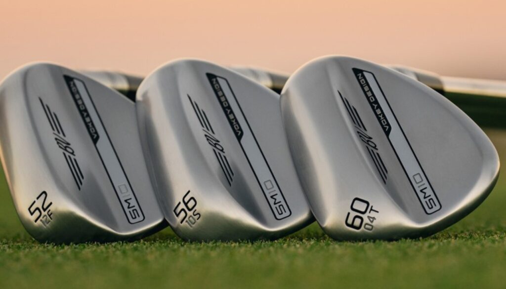 Golf wedges aligned by loft degree for distance control.