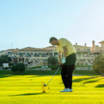 Golfer playing golf hitting wedge shot showing good distance control under pressure.