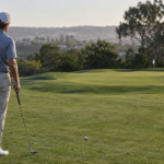 Experienced golfer behind a wedge shot moving calmly through a simple pre-shot routine on the course.